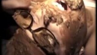 Extreme shitting on face close up